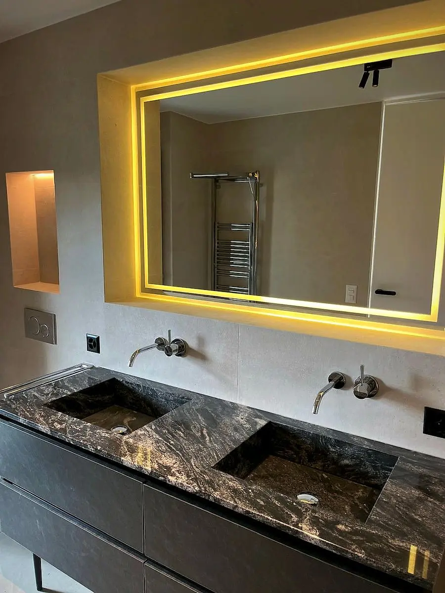 Luxury house in Founex: double stone washbasin and illuminated mirror, by Agrotherm